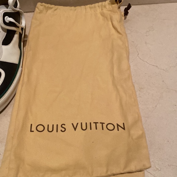 Louis Vuitton tennis shoes blue with white lather accents. main image 4